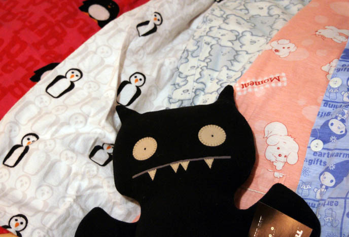 Ugly Doll bat plush toy. Cute kawaii pajamas from Hong Kong and Japan. Cute kid's nightgown, PJs with penguins.