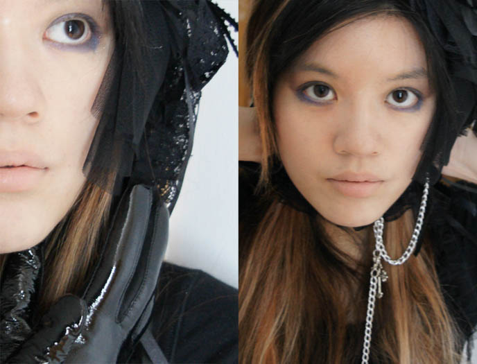 La Carmina wearing black lace choker, blue eyeshadow, pale lips and Victorian headdress or bonnet.