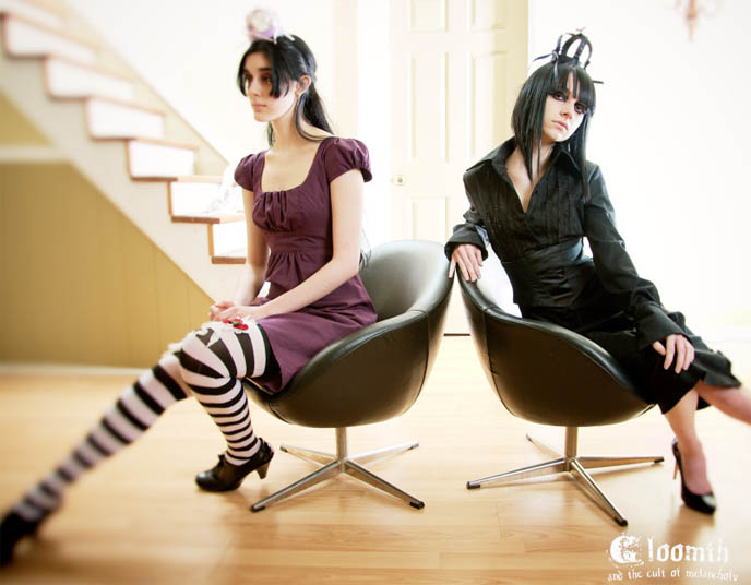 Goth girl in dress and striped tights, Gothic Lolita crown. Emo alternative punk fashion, clothing, shopping online. Custom handmade indie style from Gloomth.