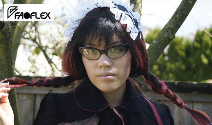 Retro cat eye glasses, fabulous sexy vintage eyewear. Asian Japanese glasses, Goth headdress, pink purple dyed hair in two braided pigtails.
