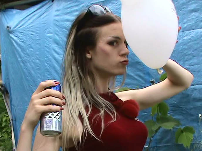 blond woman holding balloon in front of face, mickey mouse head balloons, FUNNY J-HORROR MOVIE. TOKYO GHOST STORY WITH DRAG QUEENS, COSPLAY & JAPANESE SCHOOLGIRLS, cross-dressing, goth fashion in Japan, DJ Sisen Tokyo Decadance, cute Swedish male model, transsexuals clothing and makeup