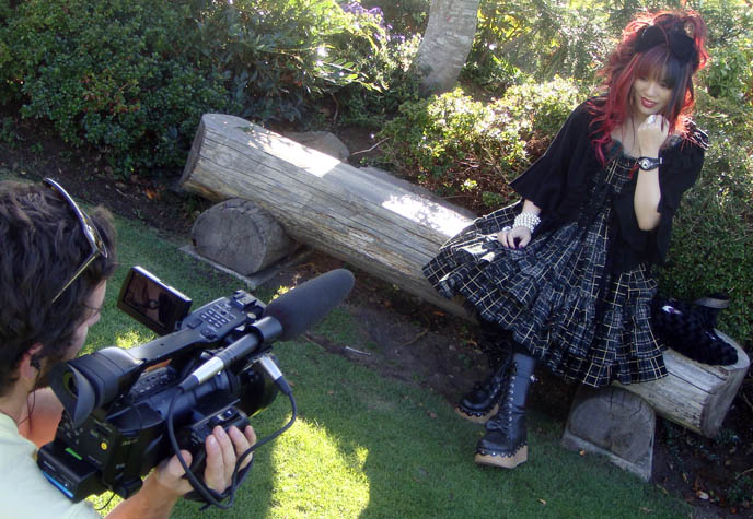 Lolitas meet up, gathering of EGL Gothic Lolitas, JAPANESE TEA PARTY LOLITA PHOTO & FILM SHOOT. CRUCIFIX ROSARY NECKLACE, PINK CURLED PRINCESS HAIR & BOOTS. checkered punk plaid lolita dress, punk loli, gosurori, documentary about gothic lolitas and Japanese Harajuku fruits fashion, world's most extreme street style