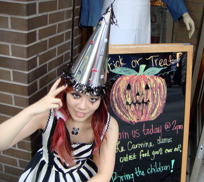 Japanese bento decoration book, CUTE BENTO BOX LUNCH DEMO VIDEO. LIVE COOKING CHARABEN TUTORIAL AT NEW YORK BOOK SIGNING, JAPANESE BENTOS LESSON, KID'S RECIPES COOKBOOK, charaben, best kid's cooking, fun quirky j-pop culture books, clown pierrot pointy silver hat, striped black and white costume Halloween.