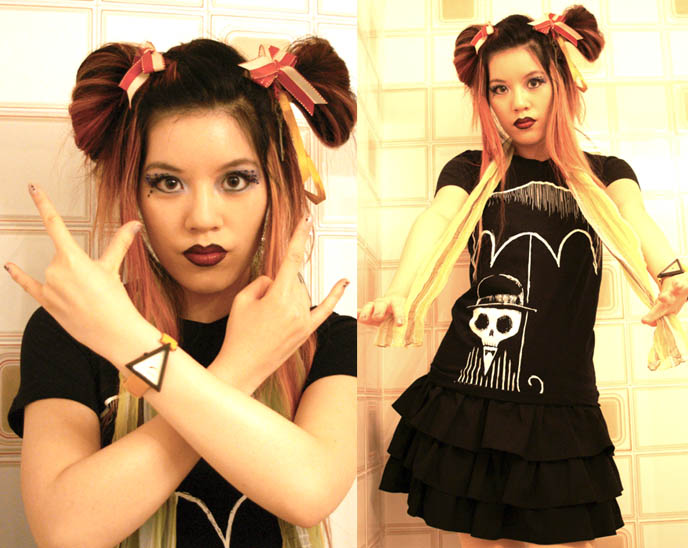 Sailor moon hair, cosplay anime hairstyles, Goth fetish makeup, SuicideGirls model, Akumu Ink gothic steampunk t-shirts, nightmare before christmas character and skull graphic design, Alexora 1980s triangle shaped watch, high exposure fashion modelling photos, La Carmina makeup and clothing line, Lime Crime black lipstick, Aromaleigh mineral eyeshadows