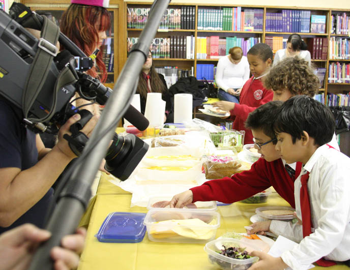 TEACHING ELEMENTARY SCHOOL CHILDREN IN HARLEM HEALTHY EATING. JAPANESE CHARACTER BENTO LESSONS IN UNDERPRIVILEGED NEW YORK CLASSROOM. onigiri hat, phoenix wright cosplay, best cosplay outfits, harlem schoolchildren, kids in underprivileged school, cooking lessons, black skull scarf, silk black goth prom dress, TEACHING CHILDREN HEALTHY EATING HABITS, CUTE CHARACTER BENTO-MAKING AT HARLEM ELEMENTARY SCHOOL. pretty Asian model, Chinese idol girl, NHK TV, KAWAII BENTOS TV SHOW: LA CARMINA, BLOGGER & CUTE YUMMY TIME AUTHOR. filming japanese game show, charaben, CUTE CHARACTER BENTO, crazy FOOD COOKING SHOW, NHK JAPAN TV DOCUMENTARY SHOOT, NEW YORK WAVE