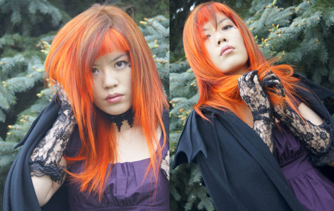 goth girl wearing cape and purple dress, cyber goths, bright neon orange hair, emo girl hairstyle, la carmina, NEW ORANGE HAIR, SPECIAL EFFECTS BRIGHT ORANGE COLORFUL DYE, JAPANESE MODERN HAIRCUTS, pumpkin head hair, extreme hairstyles, avantgarde Tokyo, LACE GLOVES, black peace now VAMPIRE CAPE, gloomth dress