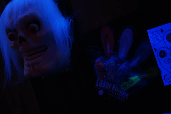 skull mask, scary glow in the dark disguise, BLUE TOKYO: COOL NIGHTLIFE PHOTOGRAPHY. JAPAN AFTER DARK, GLOWING NEON LIGHTS, WALRUS & HIS BUCKET. jpop cosplay Japan, world's weirdest strangest restaurants