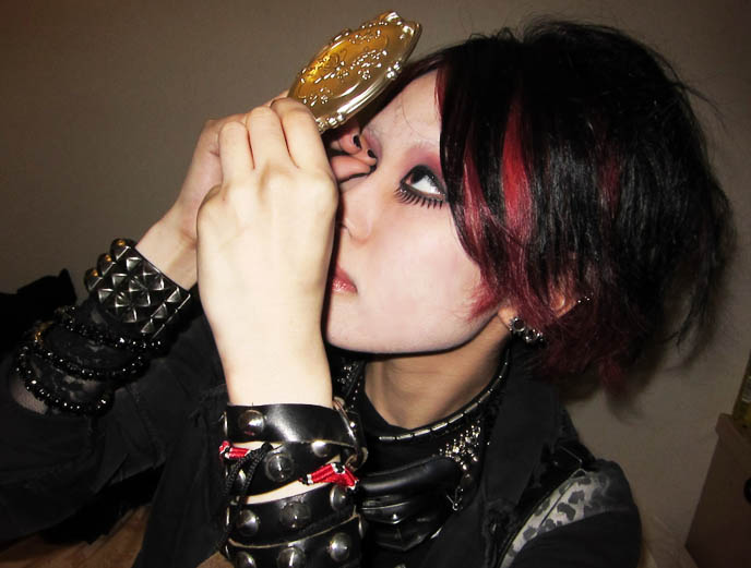 japanese goth girl, andogynous japanese girls models, gothic fashion clubs subculture, fake eyelashes, red hair dye, harajuku street snaps, street fashion tokyo japan, gothic lolita, h naoto and innocent world brand dresses, where to buy lolita clothes online.