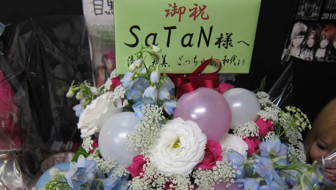 satan offerings, flower bouquet for devil, lucifer tshirts, satanic worshippers at concert, japanese wicca pentagram occult, i love satan shirt tee shirts, VIDEO: VISUAL KEI JAPANESE GOTH CONCERT IN TOKYO. LIVE JROCK PERFORMANCES: GPKISM, CALMANDO QUAL, LIX, SATAN. VISUAL KEI LABELS DARKEST LABYRINTH & STARWAVE RECORDS JOIN HEARJAPAN. GPKISM, SATAN, CALMANDO QUAL CONCERT IN TOKYO. jrock goth japanese bands live, meguro rockmaykan, alice in the dead world, OMEGA DRIPP
