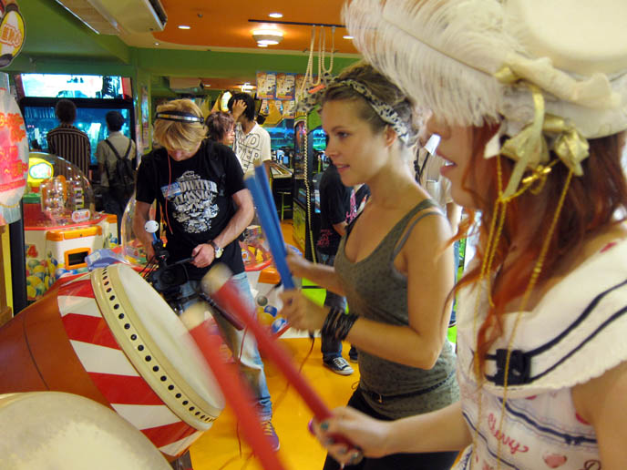 drumming video game, gaming center video games in TOKYO, japan TRAVEL TV SHOOT HOSTING & ARRANGING: DUTCH PEPSI. SEGA GAME CENTER, HARAJUKU FASHION GUIDE, japanese youth clothing fashion expert, street style, weird japan, crazy japanese activities, takeshita doori, television filming movie, netherlands, bo jeuken, watkijkjij videos netherlands, strange traveling