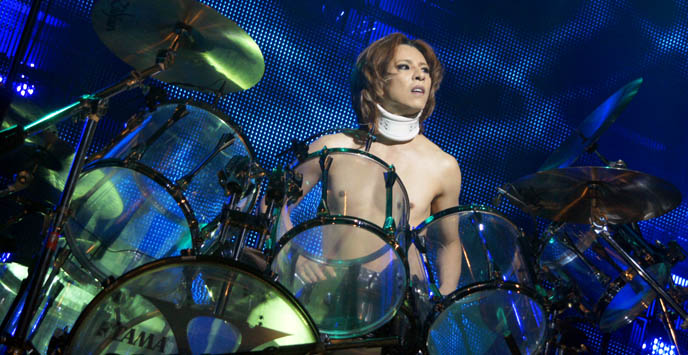 yoshiki playing drums, drummer leader of x japan, japanese most famous rock bands in japan, photos canada concert, movie dvd tour video, yoshiki at drum kit standing, hot jrockers, cute jrock boys, X JAPAN LIVE PERFORMANCE PHOTOS, CONCERT REVIEW photos of yoshiki, NORTH AMERICAN TOUR 2010, VANCOUVER. drummer pianist japanese rock stars YOSHIKI, TOSHI, SUGIZO. heath, pata, x japan concerts stage outfits, jrock concert, エックス ジャパン, visual kei artists bands music, buy j-rock tours concerts, xjapan tickets