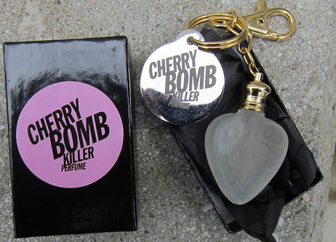 CHERRY BOMB KILLER PERFUME GIVEAWAY! ROCK N ROLL GOTH PUNK PERFUMES & HEART CHARMS. ATELIER PIERROT DRESS. my fair lady hta, sunhat wide brim, cute hats, striped black and white dress, lolita fashion, young lolitas, lolita models, asian female model, emilie autumn makeup, red doll hair, smoky eyeshadow, how to do smokey eyes, RED HAIR dye, alternative emo hairstyles